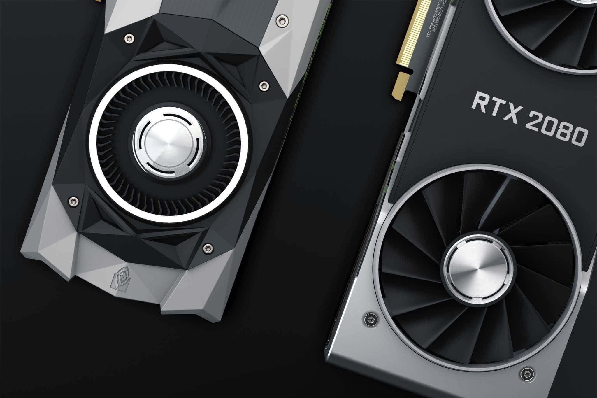 Two NVIDIA Founders Edition graphics cards laid flat on a dark surface.