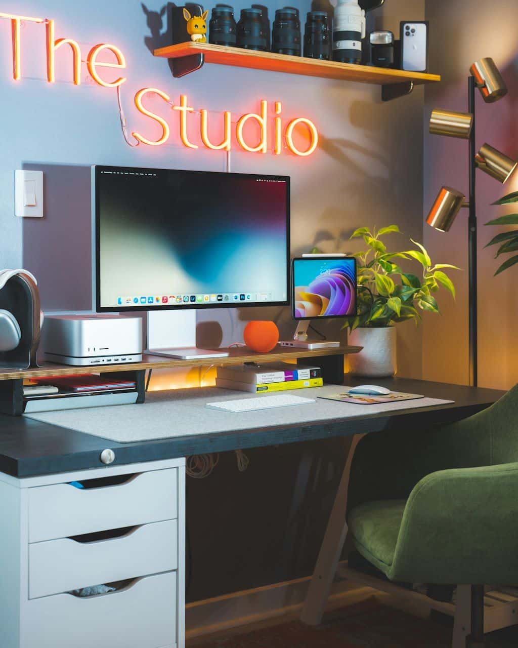 A desktop computer setup with a large monitor on a desk.