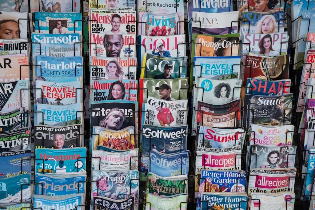 A pile of folded newspapers stacked on top of each other.