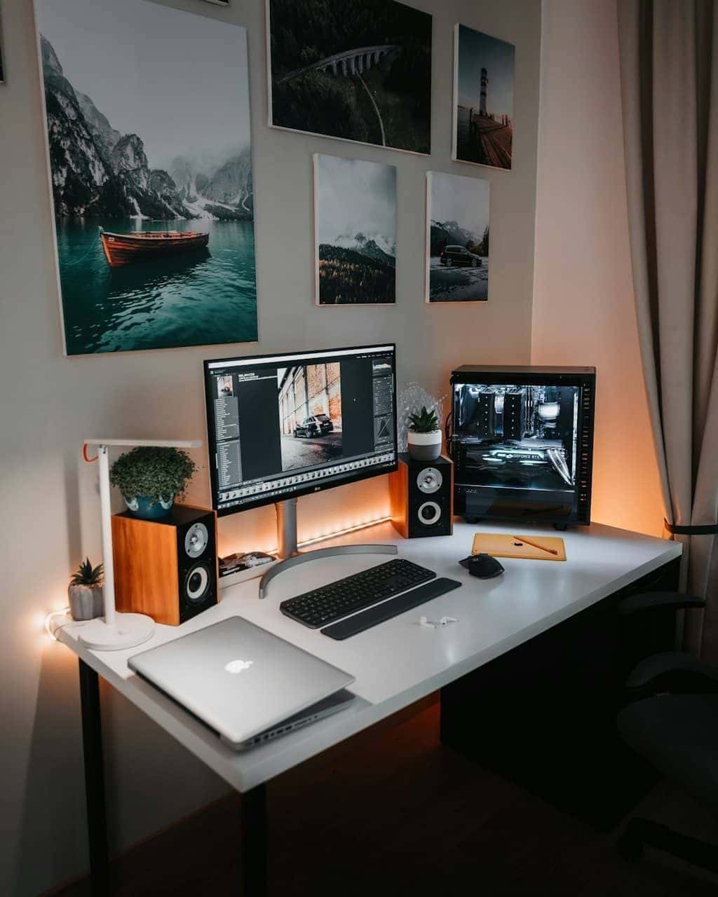 A MacBook Pro sitting open on a brown wooden desk in a quiet, minimal workspace.